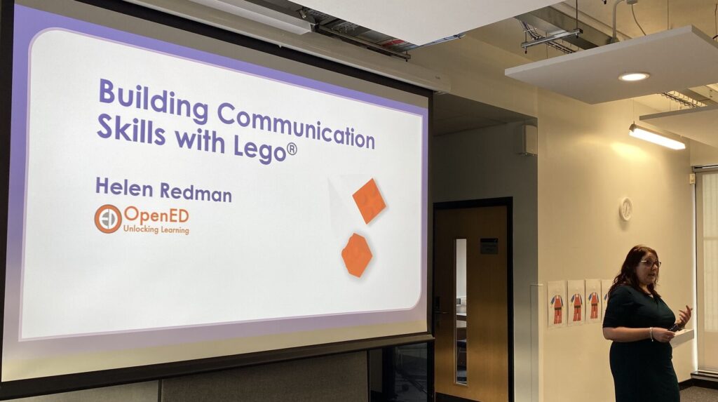 Helen Redman in front of a screen ready to start training
