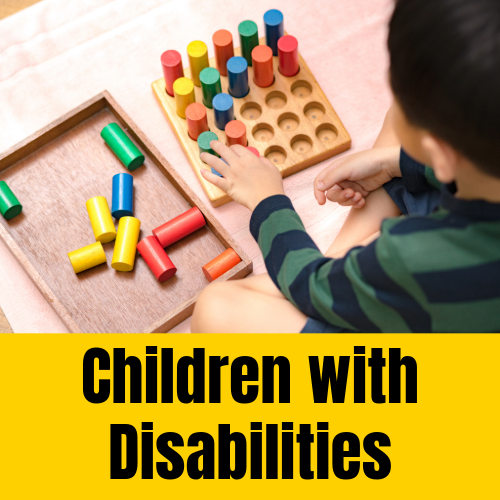 Looking down on a boy playing with building blocks. Text reads' Children with Disabilities'.